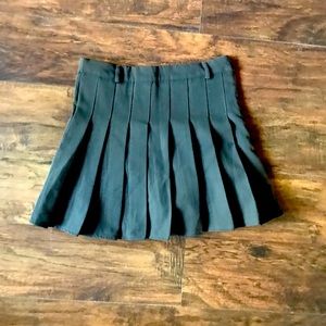 Black pleated skirt.